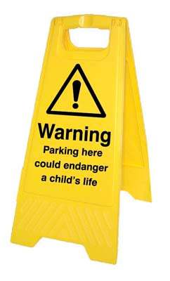 Parking here could endanger a child's life (free-standing floor sign)